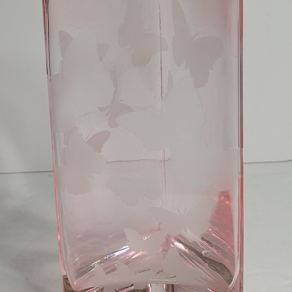 Teleflora pink vase with butterfly design. 264